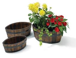 Our fibreglass garden planters are handcrafted in the uk, and are available in a wide range of colours and finishes. 40cm Burnt Wood Pine Boat Shaped Planter Large 12 99