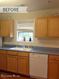 Shabby chic white kitchen cabinets. How To Update Cabinets Using Contact Paper Rental Kitchen Makeover Kitchen Cabinets Cover Update Cabinets