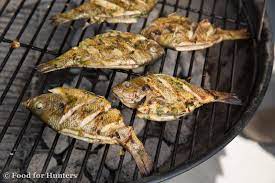 Mix well bread crumbs, parmesan cheese, parsley, oregano, basil, paprika, salt and pepper in a shallow bowl. Garlic And Lime Grilled Whole Bluegill