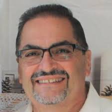 What was the name of the magician bag boy at T & T?