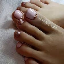 Glitter Toe Nails Gold Toe Nails Pink Toe Nails The nails use a baby pink nail polish as base color.