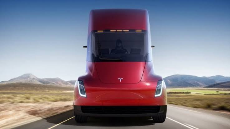 Tesla Presents Electric Truck, Updated Sports Car