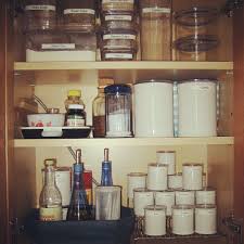 This is such an easy way to keep your bows and paper in good condition and ready to wrap a present! Organizing Kitchen Cabinets Organizingla Blog