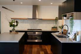 Black And White Kitchen Matt Matt Black Kitchen With Timber Shelf Detailing Caesarstone Sleek Concrete Benchtops And Herringb Simple Kitchen Design White Wood Kitchens White Kitchen Decor