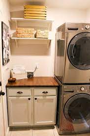 And racks and rods for drying delicates and hanging garments pulled from the dryer. 82 Remarkable Laundry Room Layout Ideas For The Perfect Home Drop Zones Homelovers Stacked Laundry Room Laundry Room Remodel Washer Dryer Laundry Room