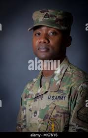 Army National Guard Sgt. 1st Class Oneil Davis, the New Jersey National  Guard's top recruiter for fiscal year 2017, stands for a portrait at  Lawrenceville Armory, N.J., Nov. 17, 2017. Davis operates