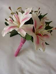 When deciding on the perfect wedding date, don't forget to take into consideration your ideal wedding colors. Tiger Lilly Wedding Bouquets The Wedding Specialists Tiger Lily Bouquet Lily Wedding Flower Girl Bouquet