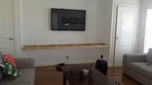 Go check it out if. Diy Floating Shelves Under A Tv