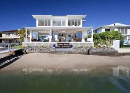 On a surface of over 1200 on a surface of over 1200 square meters, this modern, cozy and spacious house is perfect for indian ocean lovers and the mountains (you can see. Airy Beachfront Home With Contemporary Casual Style