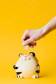 Piggy bank is the fifth track from 50 cent's second album, the massacre. Cropped Shot Of Woman Putting 50 Euro Cent Into Still Bank Isolated On Yellow 189908198 Larastock