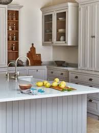 8 Light Grey Kitchen Cabinets Make The Case For Ditching White In 2020 Light Grey Kitchens Light Grey Kitchen Cabinets Kitchen Inspirations