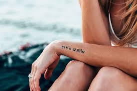 Attractive wheel and anchor navy tattoo on forearm. Travel Tattoos That Will Make You Keep Traveling Edreams