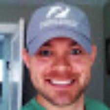 Guide Charles Burd holding a fish I caught