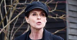 Eighties pop icon, 57, makes rare appearance with husband