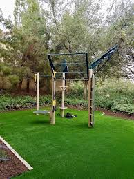 Outdoor Gym For Golf Community Fitness Area Utilizing The Custom Movrstrong T Rex Outdoor Fitness Station Backyard Jungle Gym Backyard Gym Gym Room