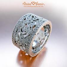 Features A 10 5mm Wide Platinum Band Encrusted With Hand Set F G Vs Brian Gavin Signature Melee Finished With Hand Mi Diamond Wedding Bands Jewelry Engagement