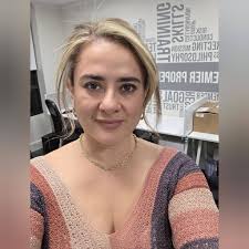 Bear walking in front of the Torrington Warner TheaterVega's Restaurante