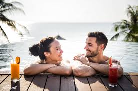 Download Premium Image Of Young Couple Relaxing At A Resort 424164 Tropical Honeymoon Tropical Honeymoon Destinations Honeymoon Pictures