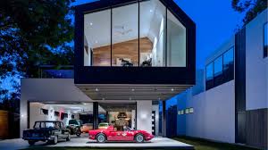 Sure, they're going to 'love' anything to do with a garage and working on cars (or at least they'll say they will). Showroom Garages Increase A Home S Curb Appeal Mansion Global