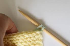 When you pick up a stitch, pull your working yarn through the stitch hole with the crochet needle or a knitting needle and slip it to needle with the rest of the click on the video below to see an example of how to pick up stitches: Knitting Tutorial How To Pick Up Stitches Underground Crafter