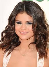 It looks like the above for females, with males getting a tendril sticking out of the top and a tighter ponytail instead. 50 Coolest Teen Hairstyles For Girls