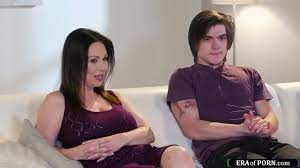 Stepson and mature stepmom get horny watching a passionate romance movie  and kiss.The big tits milf sucks his cock and titfucks him.Then gets banged  - XNXX.COM