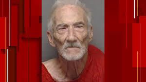 Man, 70, charged with murder in connection with shooting outside Walmart