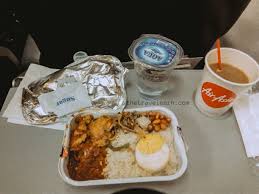 Flying on d7207 from gold coast to kuala lumpur. Nasi Lemak Pak Nasser Airasia The Travelearn