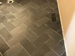 The difference between the tile and grout colors can change how noticeable the pattern becomes. Black Slate Grout Color
