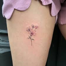 This tattoo is one that not only looks gorgeous but also holds significant meaning. 27 Charming Cherry Blossom Tattoo Examples Blossom Tattoo Cherry Blossom Tattoo Small Tattoos