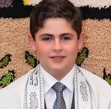 Young man celebrates triumph over tragedy