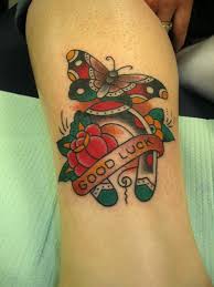 Amazing green clover leaf horseshoe tattoo on elbow. Traditional Butterfly Rose Horseshoe Tattoo By Krooked Ken Flickr