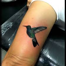 With sleek, bold black lines and the tiniest bit of color, this tattoo is basically a gem in my book. 50 Stunning Hummingbird Tattoo Design Ideas And What They Mean Saved Tattoo