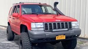 Image result for Flame Red 1998 Jeep