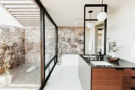 Brown bathroom tile ideas with mediterranean style. Why Homeowners Are Remodeling Their Master Bathrooms In 2019