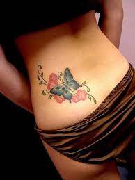 31 Simple Yet Striking Tattoos And What They Mean Lower Back Tattoo Designs Tattoo Designs For Girls Girl Back Tattoos