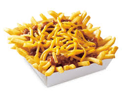 Fries Snacks Wienerschnitzel French Fries Curly Fries Fried chickens,cheese burger with fries on wooden chopping board with vintage canvas background.view from french fries with cheese sauce. wienerschnitzel french fries