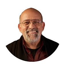 Original Ella Neustein batik of little with hat (cap) “Softening Keds”.  That's what it looks like.