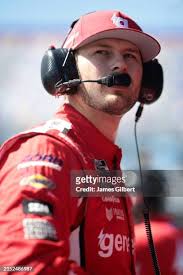 Ryan Blaney, driver of the Menards/Maytag Ford, walks the grid during...  News Photo