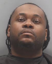 Two men arrested for shooting death of woman