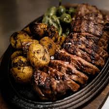 Summer means it's time to get out there and grill for practically every meal. Grilled New York Strip Steak With Spring Garlic Butter St Francis Winery Vineyards