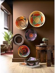 Swazi Bowls A Great Way To Display Them Great Colours That Go Well With The Brown Walls African Home Decor Decor Southwestern Decorating