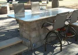 Both grill options can have wheels that makes your outdoor patio more functional if it needs to shift. Outdoor Kitchen Landscaping And Landscape Design For Patio Retaining Wall Backyard And More