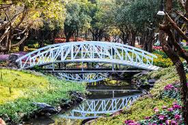 Maxxprime 5 ft wooden garden bridge arc stained finish footbridge with safety railings for backyard, decorative pond bridge, stained wood. Beautiful Small Wooden Bridge In The Flower Garden Stock Photo Picture And Royalty Free Image Image 72097261