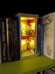 Hey Folks Just Wanted To Share With You My Work In Progress Moria Book Nook It Took A While To Create Gandalf And Balrog W In 2020 Book Nooks Book Making Fairy Doors