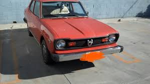 Image result for Herald Yellow 1974 Subaru