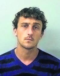 Drug dealers threatened to burn down heroin addict's house