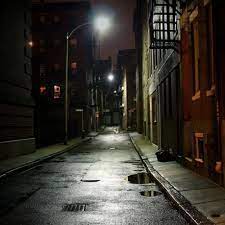 Door at end of dark alleyway. Photographing Danger Dark Street Dark City Background