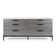 A mirrored dresser coupled with an equally snazzy mirror and a chic chair shapes a makeup vanity that brings back the charm of hollywood regency style at its impressive best. Bella Centro Dresser