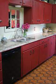 Painting cabinets doesn't require a lot of skill and is a quick job compared to most other kitchen improvement projects (even when you factor in use these ideas to inspire you; Reloved Rubbish Chalk Paint Kitchen Cabinets Red Kitchen Cabinets Red Kitchen Decor